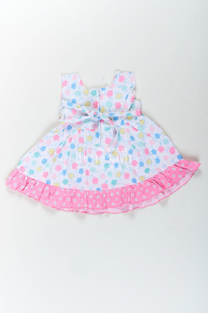 The Nesavu Baby Cotton Frocks Baby girl cotton frock with bow and floral print for casual summer days Nesavu Nesavu baby girl cotton frock pink bow floral print perfect summer playdates daily wear