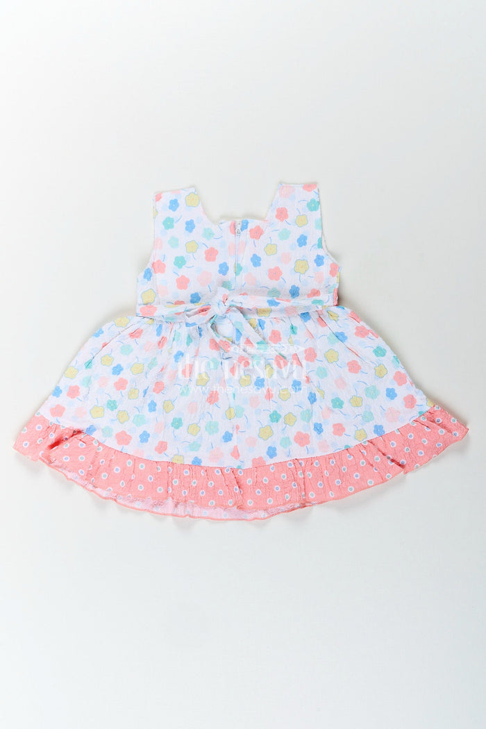 The Nesavu Baby Cotton Frocks Baby girl cotton frock with pastel floral print and ruffle hem Nesavu Nesavu baby girl frock with pastel floral print and ruffled hem in soft sheer cotton