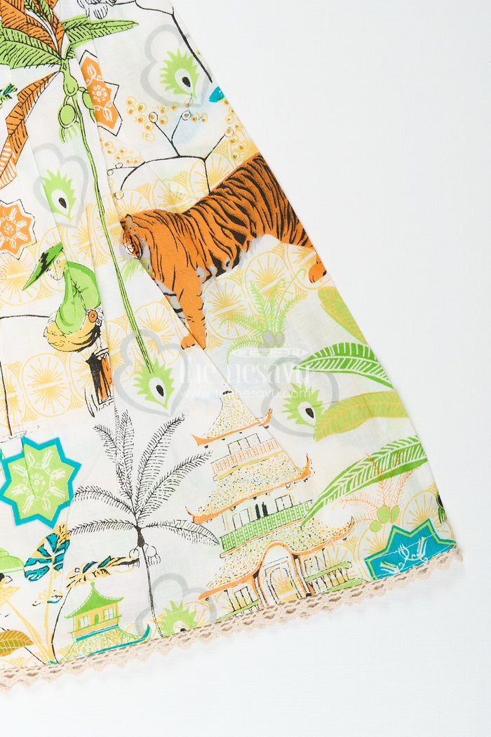 The Nesavu Baby girl frock with nature-inspired print for playful days Nesavu Nesavu baby girl frock jungle-inspired print playful cotton outfit casual themed wear