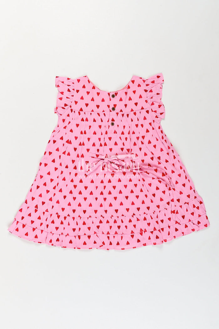 The Nesavu Girls Cotton Frock Girls Single Piece Frock in Pink Cotton with Red Heart Digital Print and Ruffled Finish Nesavu Nesavu Girls Pink Cotton Single Piece Frock Red Heart Print Ruffle Hem Detailing
