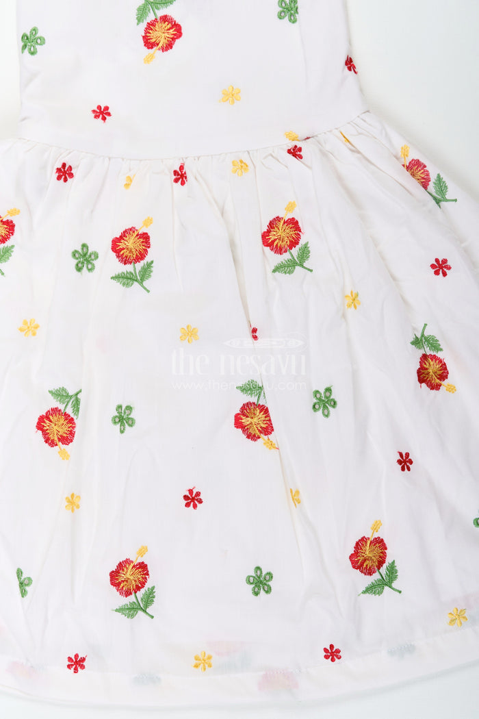 The Nesavu Girls Cotton Frock Girls White Floral Frock in Cotton Embroidery with Delicate Ruffles and Playful Design Nesavu Girls White Floral Frock Cotton Embroidery Ruffled Sleeves Flared Skirt | The Nesavu