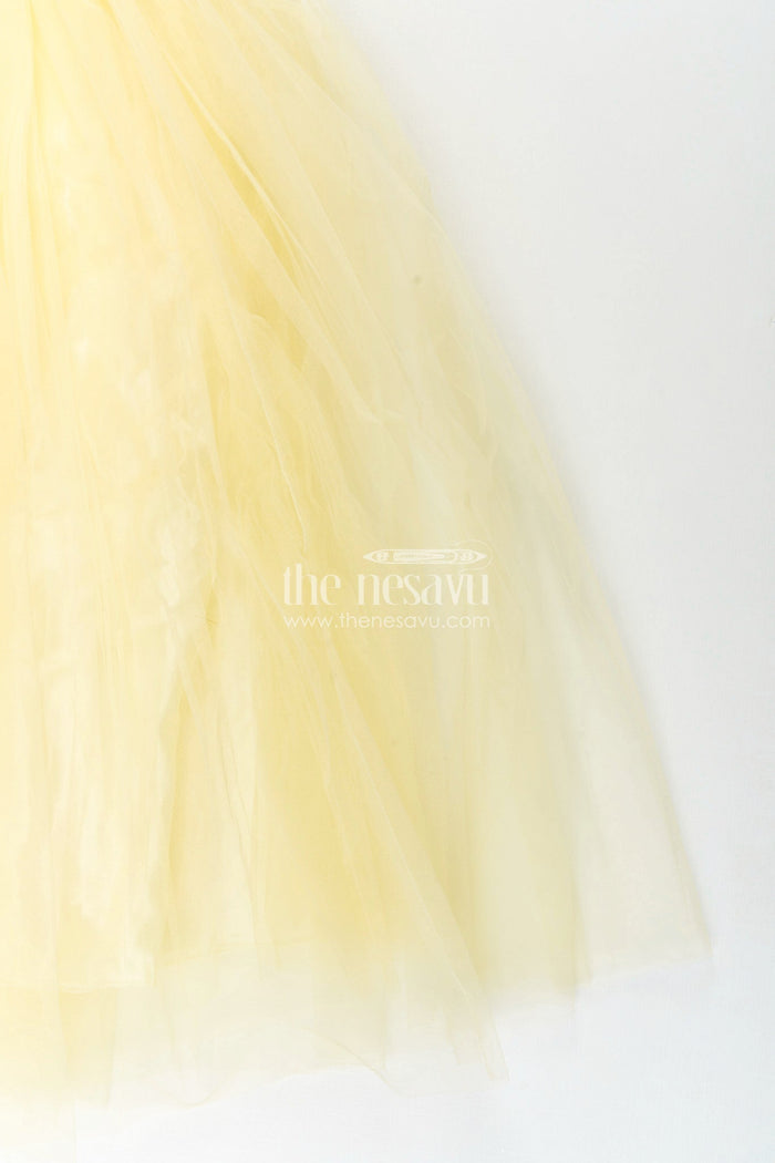 The Nesavu Girls Party Gown Satin and net party gown for girls with bead embroidery Nesavu Nesavu girls yellow party gown with satin bodice and embroidered net flare
