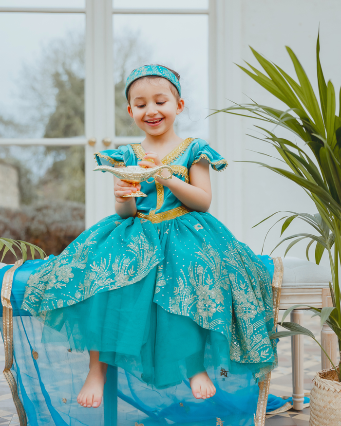 The Amira, turquoise velvet princess dress with gold lace detailing