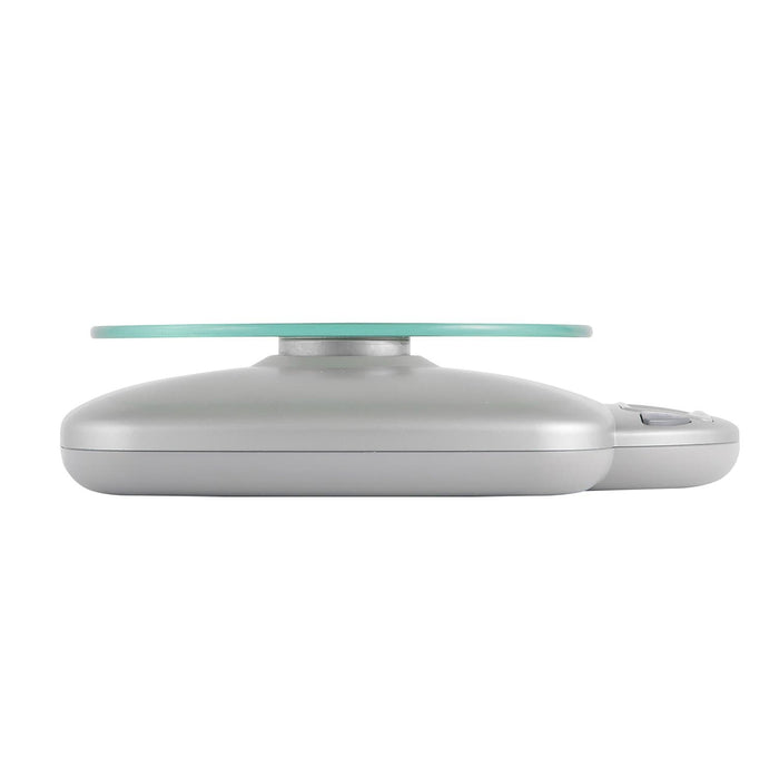 Side view of a digital kitchen scale with a glass weighing platform.