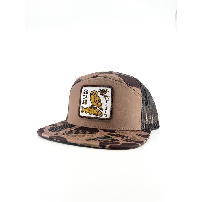 Fowl Hooked Duck Camo trucker hat with mesh back and embroidered owl patch