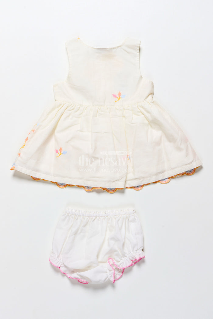 The Nesavu Baby Frocks Baby Frock with Rainbow Leaf Embroidery and Floral Patch Nesavu Nesavu cream baby frock with rainbow embroidery and floral detail