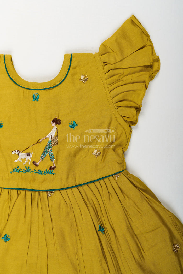 The Nesavu Girls Chanderi Frock Baby girl chanderi frock for casual family outings Nesavu Nesavu mustard chanderi frock for baby girls with playful dog embroidery for casual occasions