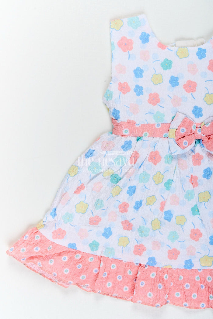 The Nesavu Baby Cotton Frocks Baby girl cotton frock with pastel floral print and ruffle hem Nesavu Nesavu baby girl frock with pastel floral print and ruffled hem in soft sheer cotton