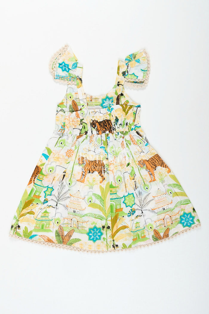 The Nesavu Baby girl frock with nature-inspired print for playful days Nesavu Nesavu baby girl frock jungle-inspired print  playful cotton outfit casual themed wear