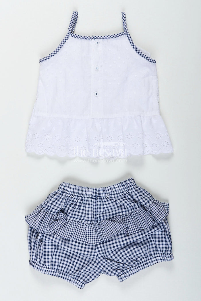 The Nesavu Baby Frocks Baby girl frock with navy gingham shorts and bow detailing Nesavu Nesavu white hakoba baby frock with navy checked bloomers
