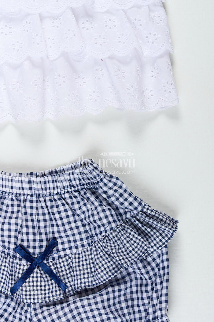 The Nesavu Baby Frocks Baby girl frock with navy gingham shorts and bow detailing Nesavu Nesavu white hakoba baby frock with navy checked bloomers