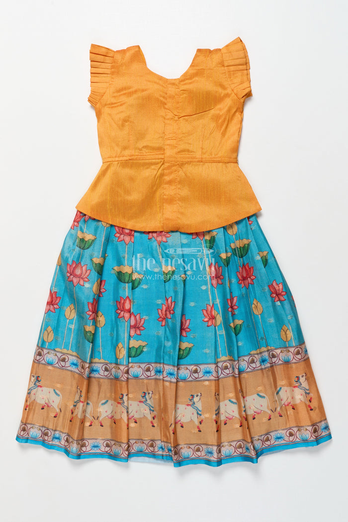 The Nesavu Pattu Pavadai Baby Girl Pattu Pavadai with Animal Border Print for Traditional Functions Nesavu Nesavu baby girl pattu pavadai lotus cow border print festive functions