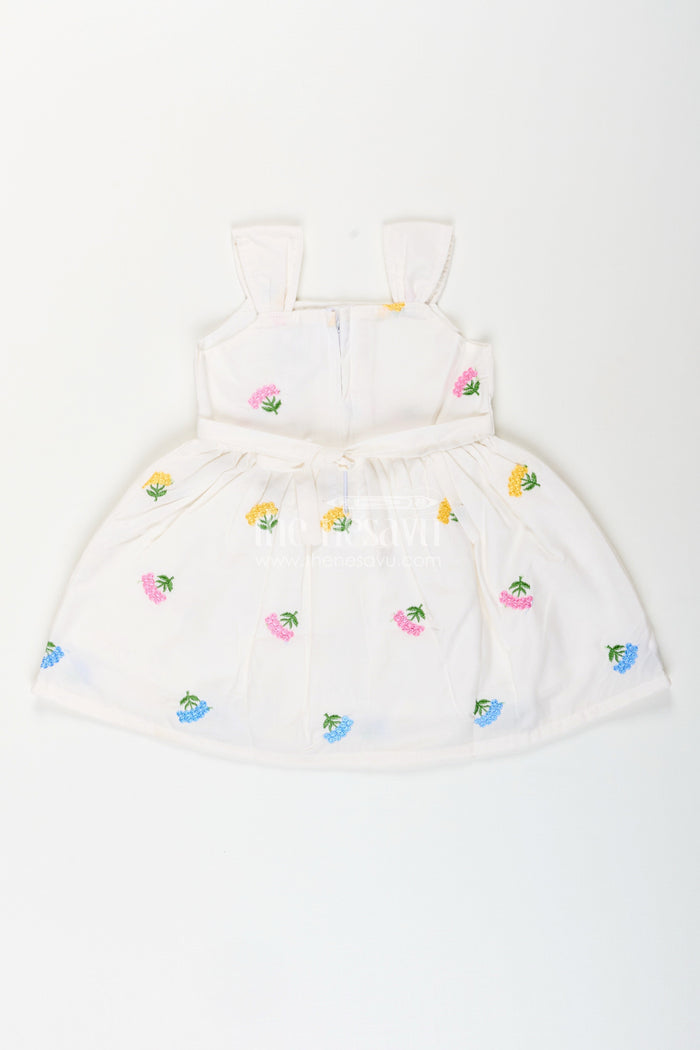 The Nesavu Baby Cotton Frocks Baby girl white cotton frock with floral embroidery for casual outings Nesavu Nesavu baby girl white cotton frock with pastel floral embroidery for casual summer days