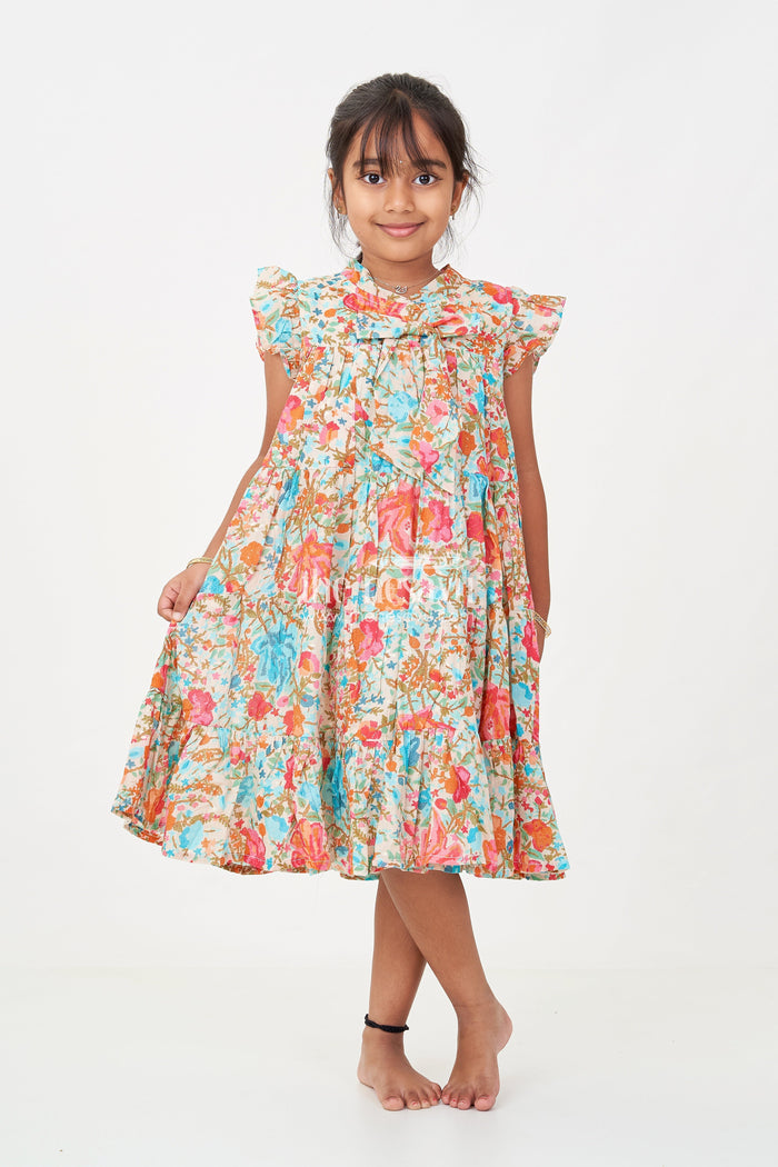 The Nesavu Girls Cotton Frock Baby Girls Cotton Frock in Floral Digital Print with Ruffle Sleeves and Front Bow Nesavu 18 (2Y) / Multicolor GFC1701A-18 Nesavu Baby Girls Cotton Frock Colorful Floral Digital Print Ruffle Sleeve Design