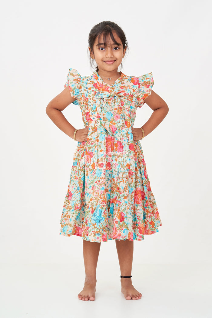 The Nesavu Girls Cotton Frock Baby Girls Cotton Frock in Floral Digital Print with Ruffle Sleeves and Front Bow Nesavu Nesavu Baby Girls Cotton Frock Colorful Floral Digital Print Ruffle Sleeve Design