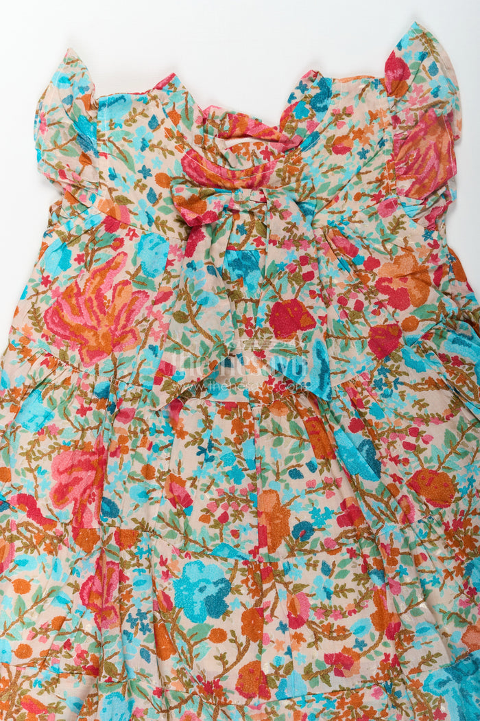 The Nesavu Girls Cotton Frock Baby Girls Cotton Frock in Floral Digital Print with Ruffle Sleeves and Front Bow Nesavu Nesavu Baby Girls Cotton Frock Colorful Floral Digital Print Ruffle Sleeve Design