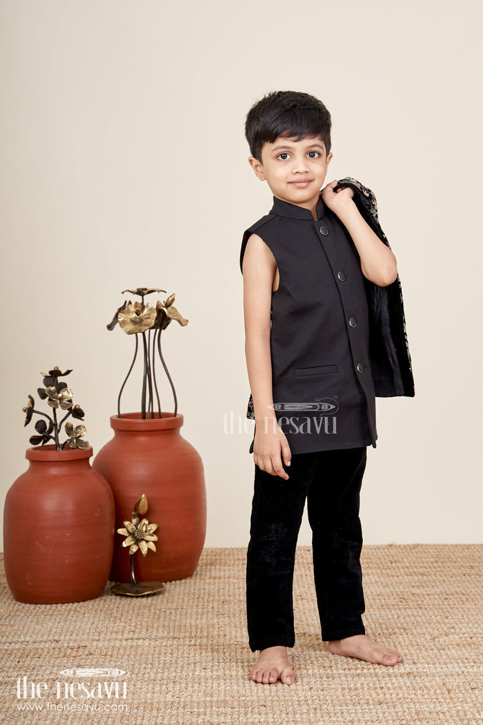The Nesavu Boys Sherwani Black velvet floral embroidered boys sherwani with matching pants Nesavu Nesavu black velvet boys sherwani set with floral embroidery