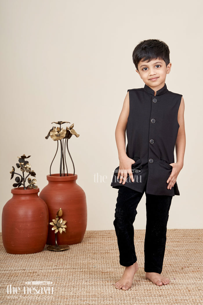 The Nesavu Boys Sherwani Black velvet floral embroidered boys sherwani with matching pants Nesavu Nesavu black velvet boys sherwani set with floral embroidery