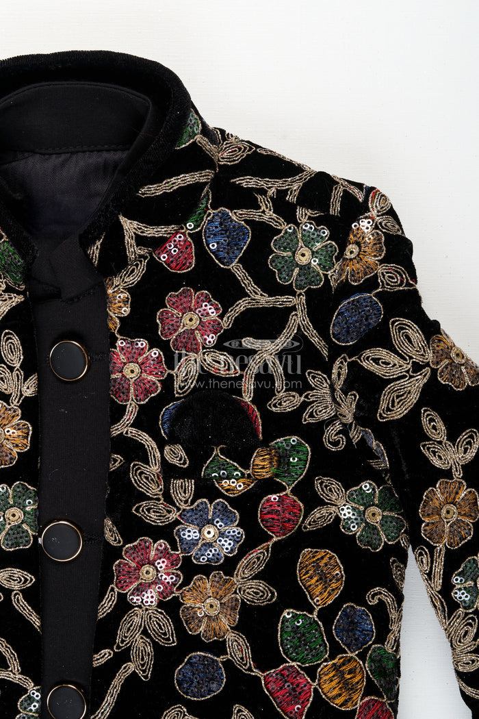 The Nesavu Boys Sherwani Black velvet floral embroidered boys sherwani with matching pants Nesavu Nesavu black velvet boys sherwani set with floral embroidery