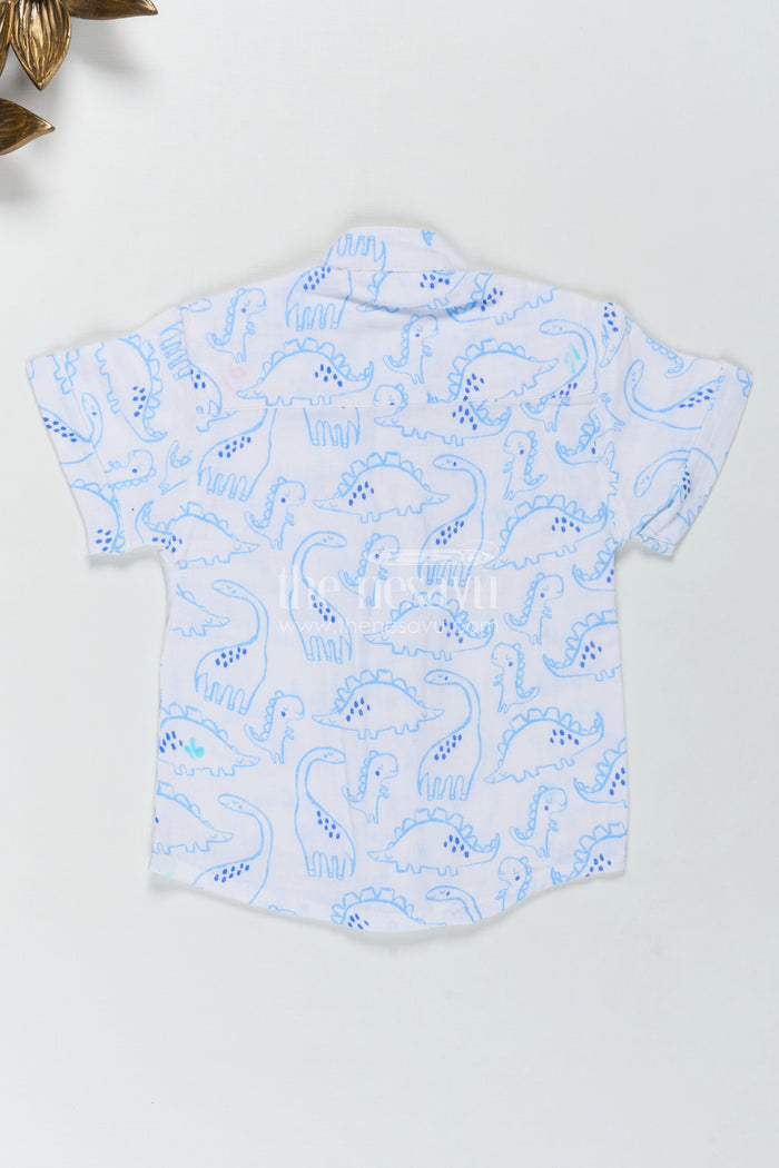 The Nesavu Boys Cotton Shirt Blue Dino Print Boys Shirt in Muslin Cotton Playful and Smart Design Nesavu Nesavu Boys Muslin Cotton Dinosaur Shirt Blue Dino Prints Lightweight Everyday Comfort
