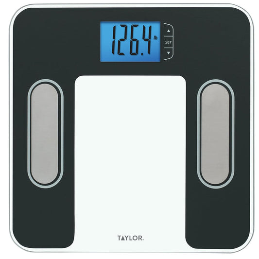 Close-up of a black body composition scale with stainless steel accents and a blue backlit display.
