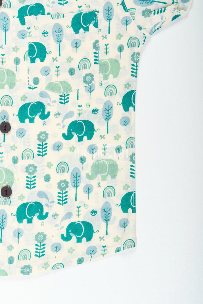The Nesavu Boys Cotton Shirt Boys elephant print shirt in teal tones for playful ethnic wear Nesavu Nesavu boys cotton shirt green elephant print  perfect ethnic school days festive wear