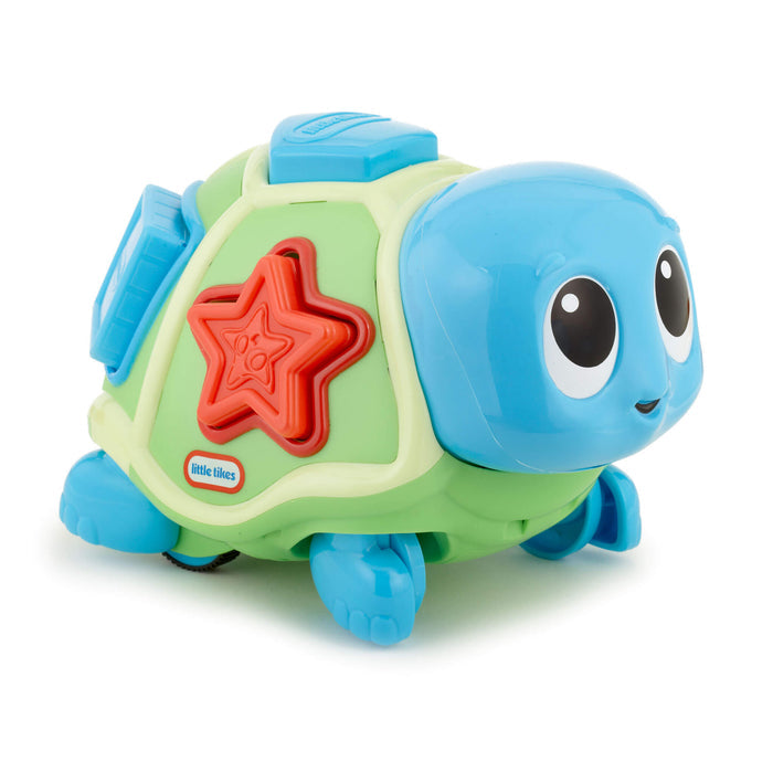 Toy turtle with a red star  shape on a white background