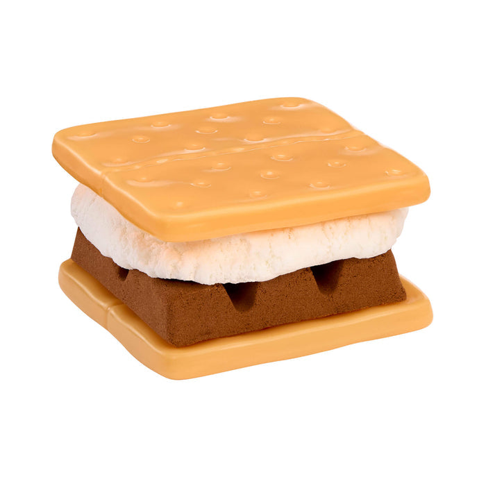 Toy s'mores set with a graham cracker, chocolate, and marshmallow on a white background