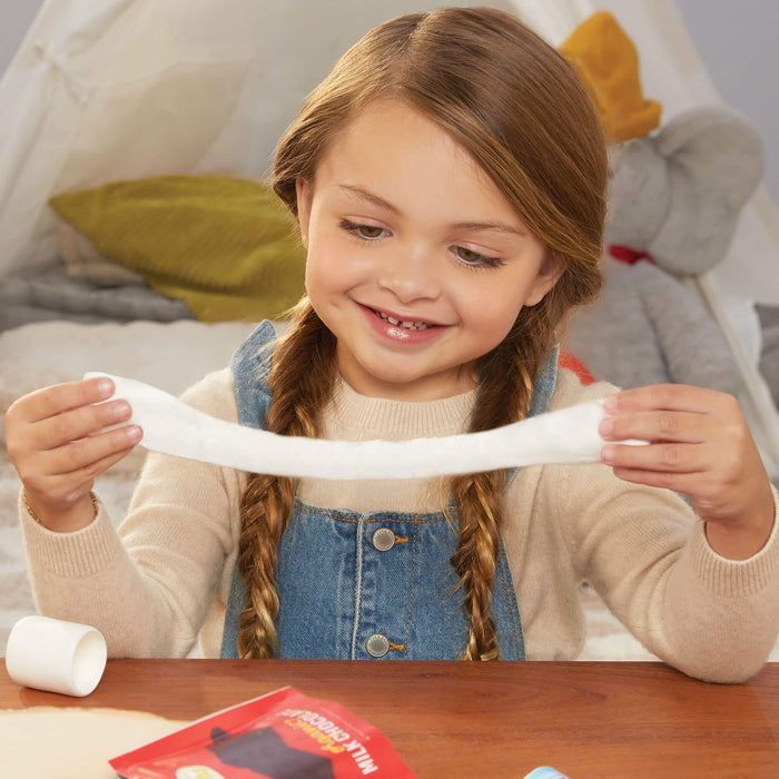 Girl stretching dough