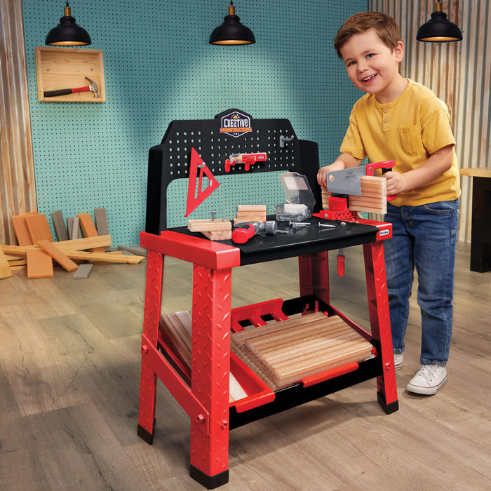 Boy using the Creative Construction Workbench