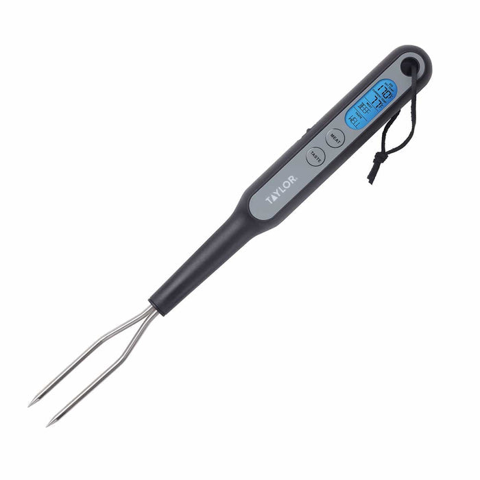 Taylor digital fork thermometer with two stainless steel prongs and gray body showing a blue backlit display