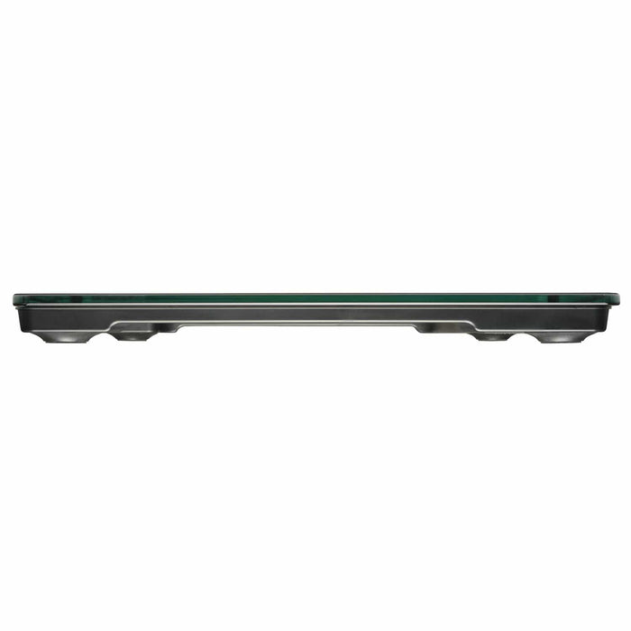 Side view of a digital glass non-slip bathroom scale with dark base and glass top