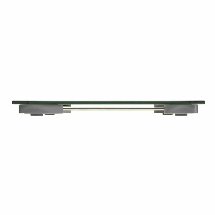 Side view of a digital glass bathroom scale with stainless steel supports.
