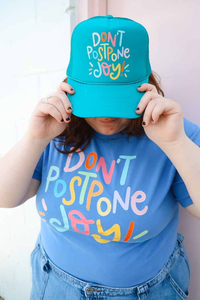 Don't Postpone Joy Trucker Hat