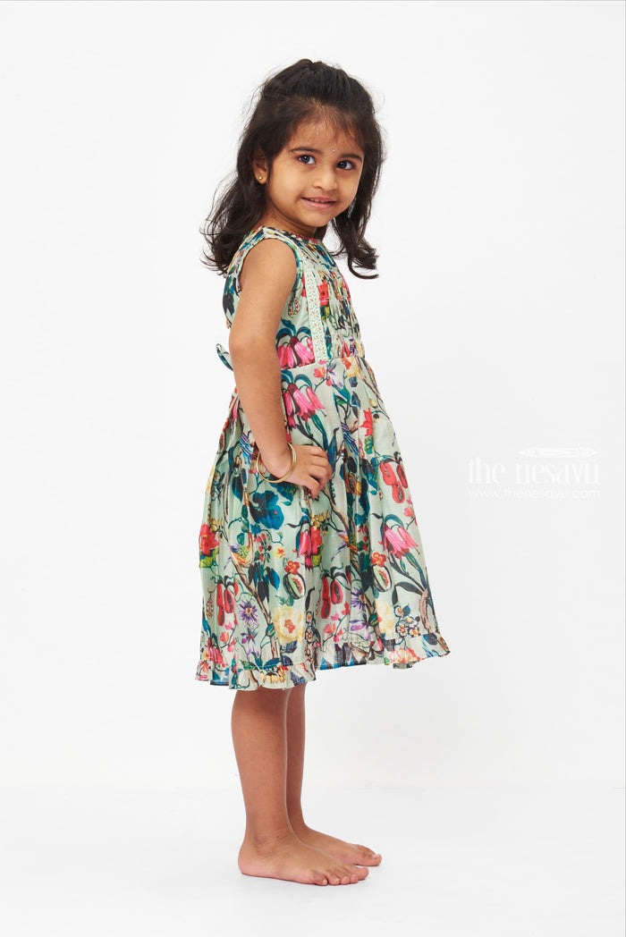 The Nesavu Girls Cotton Frock Enchanted Garden Cotton Dress: Exotic Floral Print Frock for Girls with Lace Details Nesavu Girls Teal Exotic Floral Lace Dress | Summer Garden Party Frock | Playful Cotton Wear | The Nesavu