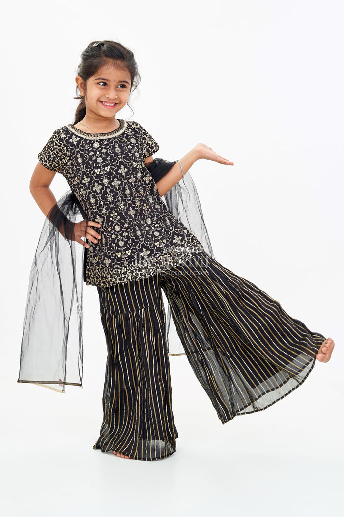 The Nesavu Girls Sharara / Plazo Set Girls Black Kurti Plazo Set with Sequined Embroidery and Tissue Silk Dupatta for Festive Occasions Nesavu 16 (1Y) / Black GPS522A-16 Girls Black Kurti Plazo Set Sequined Embroidery Tissue Silk Dupatta Festive Wear | The Nesavu