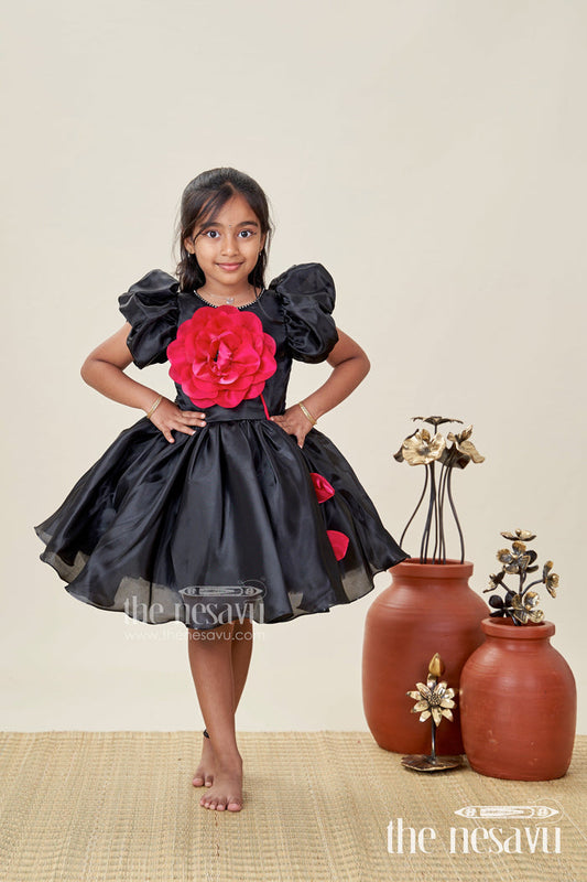 The Nesavu Girls Fancy Party Frock Girls Black Satin Frock Ke Design New with Puffy Sleeves and Red Floral Accent for Stylish Comfort Nesavu 16 (1Y) / Black PF223B-16 Nesavu Girls Black Satin Puff Sleeve Dress Red Flower Detail frock ke design new Style