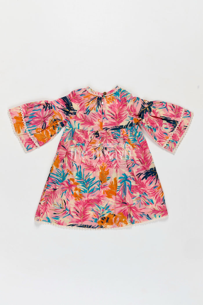 The Nesavu Girls Cotton Frock Girls Cotton Frock Girl with Flared Bell Sleeves and Vibrant Leaf Print in Multicolor Design Nesavu Nesavu Cotton Frock Girl Flared Sleeves Multicolor Leaf Print Casual Everyday Style