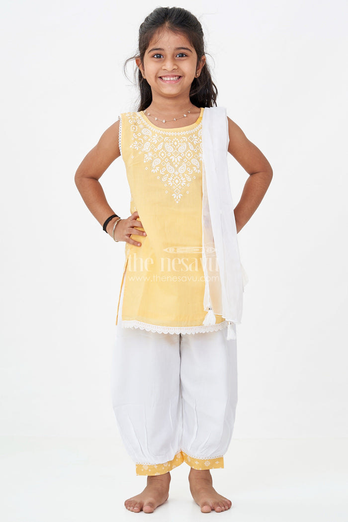 The Nesavu Girls Churidar Sets Girls Cotton Latest Chudi Set in Yellow with Stone Embellishment and Contrasting Dhoti Bottoms Nesavu Girls Yellow Cotton Chudi Set Embroidered Top White Dhoti Pants Ethnic Look | The Nesavu