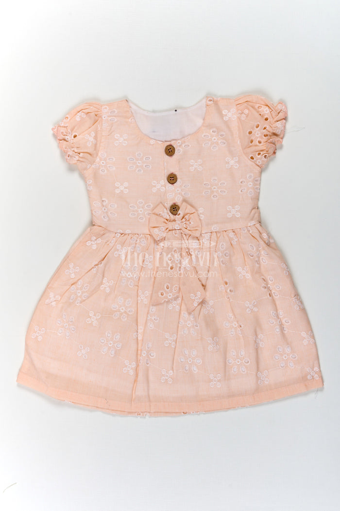 The Nesavu Girls Cotton Frock Girls Cotton Sleeveless Dress in Pastel Peach with All-Over Hakoba Floral Embroidery Nesavu 18 (2Y) / Orange GFC1714A-18 Nesavu Cotton Sleeveless Dress for Girls in Peach Hakoba Fabric with Embroidery and Button Detail