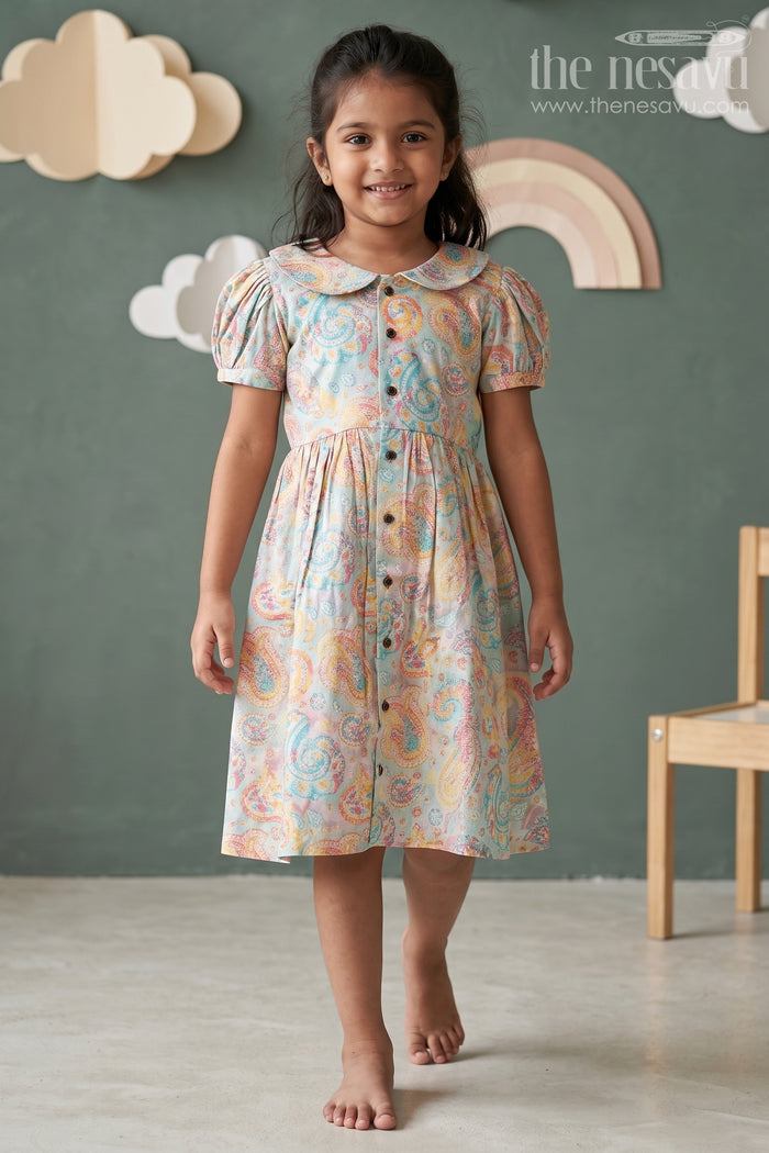 The Nesavu Girls Cotton Frock Girls Cotton Wear Dress with Vibrant Paisley Digital Prints and Pleated Waist for Casual Comfort Nesavu 18 (2Y) / Cream GFC1705A-18 Girls Cotton Wear Dress Vibrant Paisley Digital Prints Ruffled Collar Design | The Nesavu