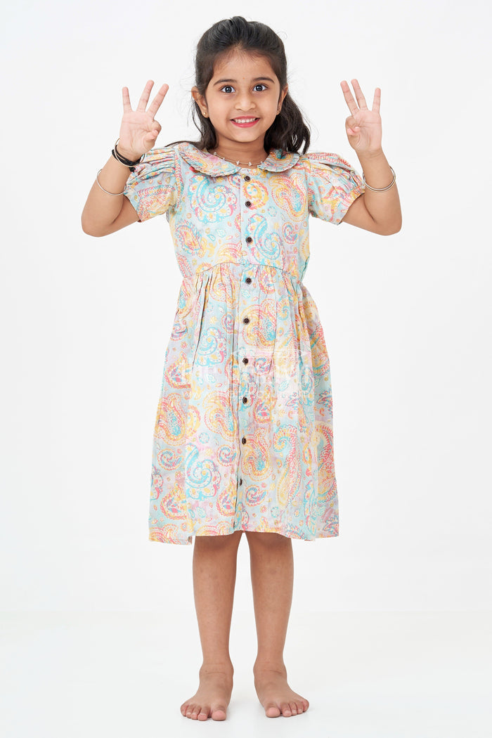 The Nesavu Girls Cotton Frock Girls Cotton Wear Dress with Vibrant Paisley Digital Prints and Pleated Waist for Casual Comfort Nesavu 18 (2Y) / Cream GFC1705A-18 Girls Cotton Wear Dress Vibrant Paisley Digital Prints Ruffled Collar Design | The Nesavu
