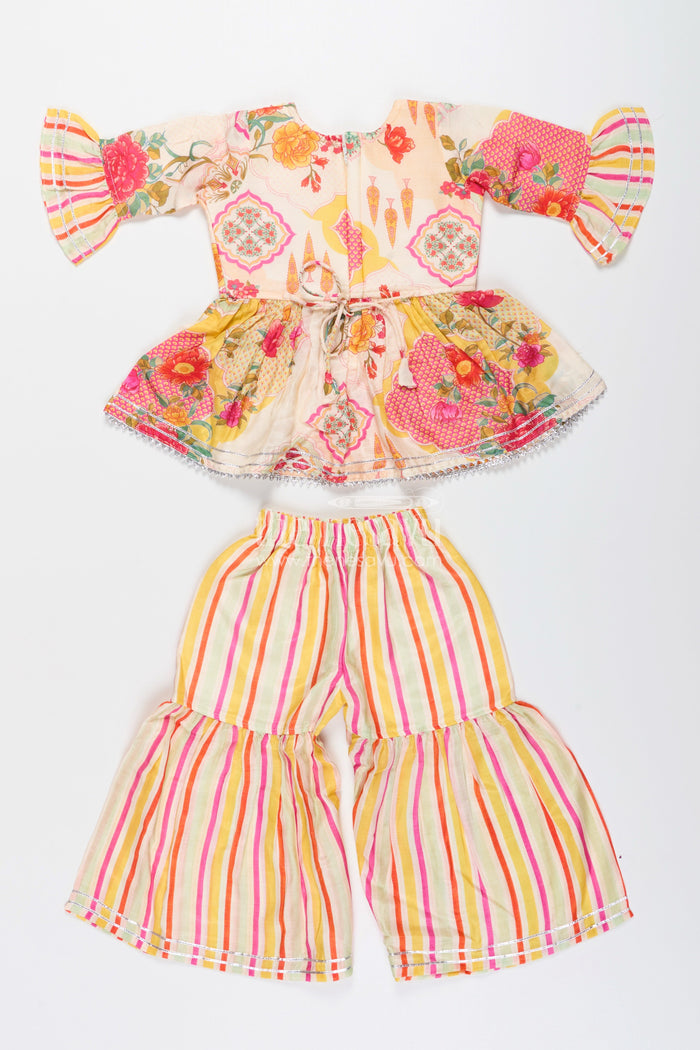 The Nesavu Girls Sharara / Plazo Set Girls cream sharara set with floral top for ethnic parties and photoshoots Nesavu Nesavu girls cream sharara set floral digital print striped pants  festive party outfit