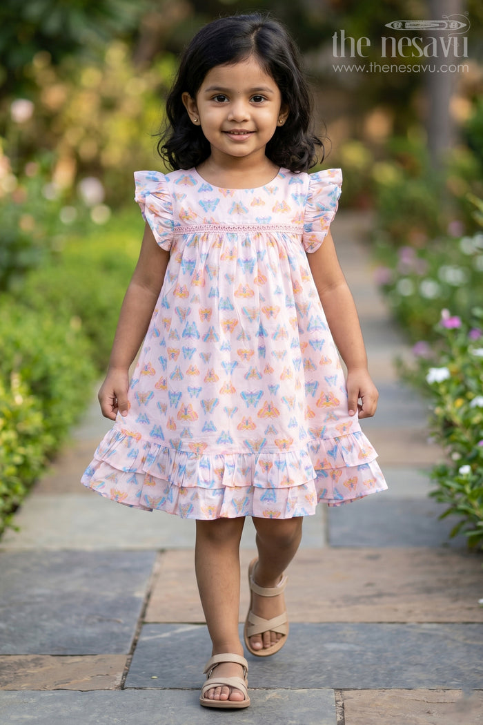 The Nesavu Girls Cotton Frock Girls Frill Sleeve Frock in Cotton with Butterfly Digital Print and Ruffle Hem for Breezy Everyday Style Nesavu 18 (2Y) / Pink GFC1762A-18 Nesavu Girls Frill Sleeve Frock Cotton Butterfly Digital Print Ruffled Hem Design