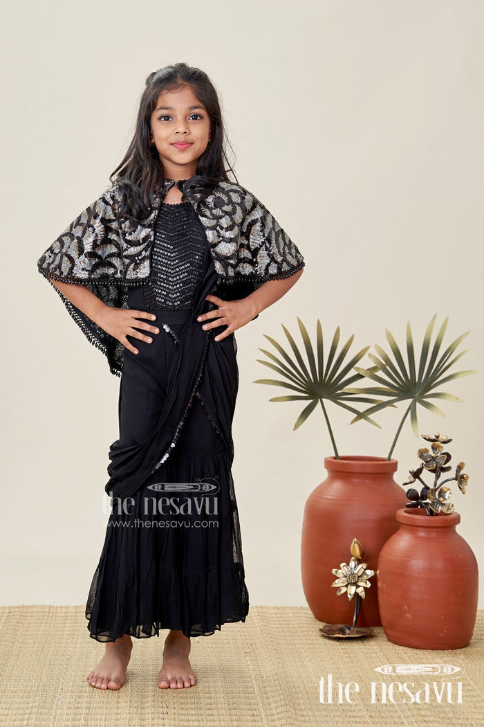 The Nesavu Girls Sharara / Plazo Set Girls Indo Western Sharara Set with Sequin Cape and Crop Top Nesavu Nesavu Black Cape Style Sharara Set Girls Sequin Crop Top Flared Pants