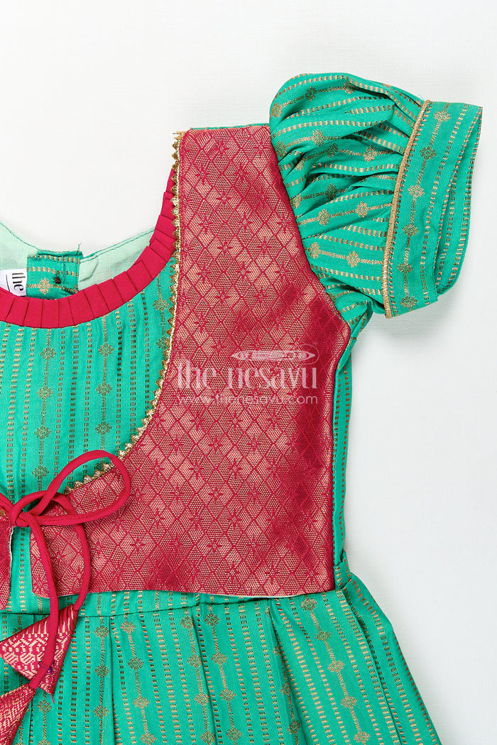 The Nesavu Girls Kanchi Silk Frock Girls Kanchivaram Silk Design Frock with Puff Sleeves Green Body and Maroon Zari Border Overlay Nesavu Nesavu Girls Kanchivaram Silk Design Frock Puff Sleeves Traditional Maroon Green Color Blend