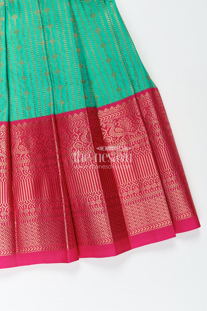 The Nesavu Girls Kanchi Silk Frock Girls Kanchivaram Silk Design Frock with Puff Sleeves Green Body and Maroon Zari Border Overlay Nesavu Nesavu Girls Kanchivaram Silk Design Frock Puff Sleeves Traditional Maroon Green Color Blend