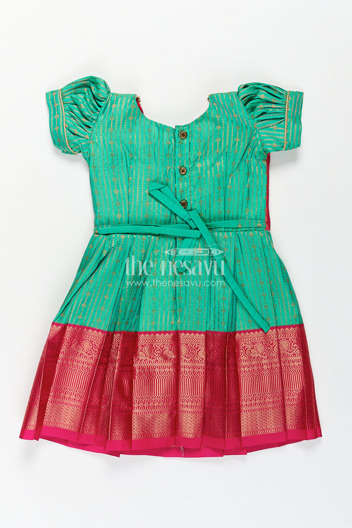 The Nesavu Girls Kanchi Silk Frock Girls Kanchivaram Silk Design Frock with Puff Sleeves Green Body and Maroon Zari Border Overlay Nesavu Nesavu Girls Kanchivaram Silk Design Frock Puff Sleeves Traditional Maroon Green Color Blend