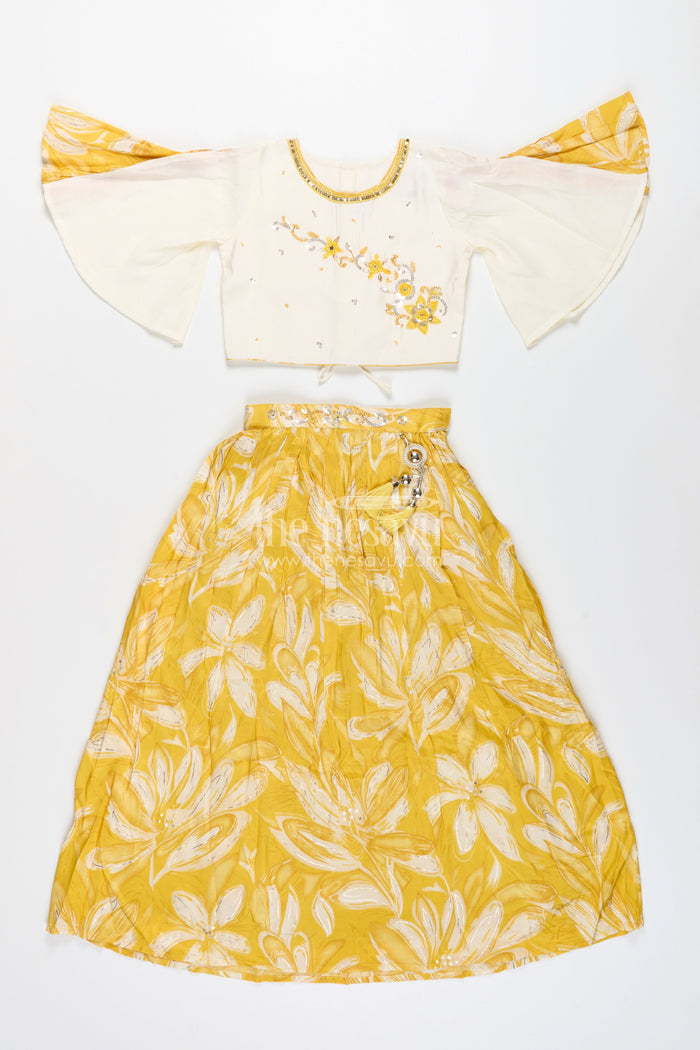 The Nesavu Girls Lehenga Choli Girls lehenga choli set with floral print and flutter sleeves Nesavu Nesavu yellow floral lehenga choli set girls flutter sleeves  festive haldi outfit