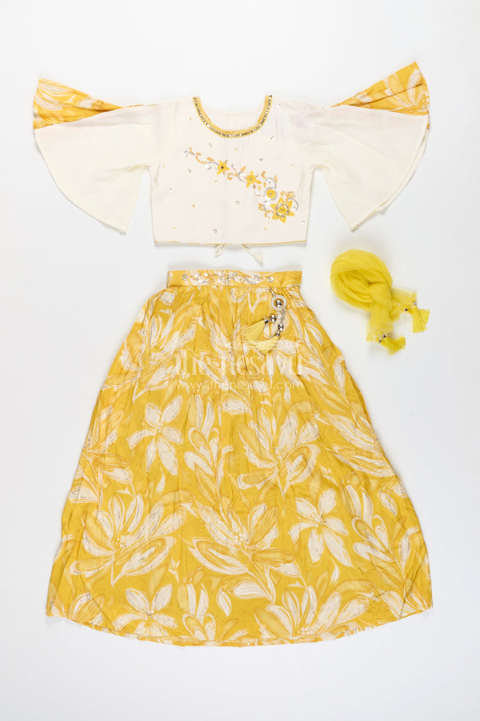 The Nesavu Girls Lehenga Choli Girls lehenga choli set with floral print and flutter sleeves Nesavu Nesavu yellow floral lehenga choli set girls flutter sleeves  festive haldi outfit